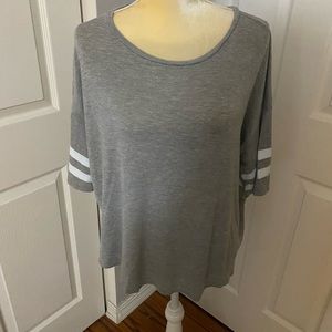 American Eagle Jersey T in gray with white striped sleeves.